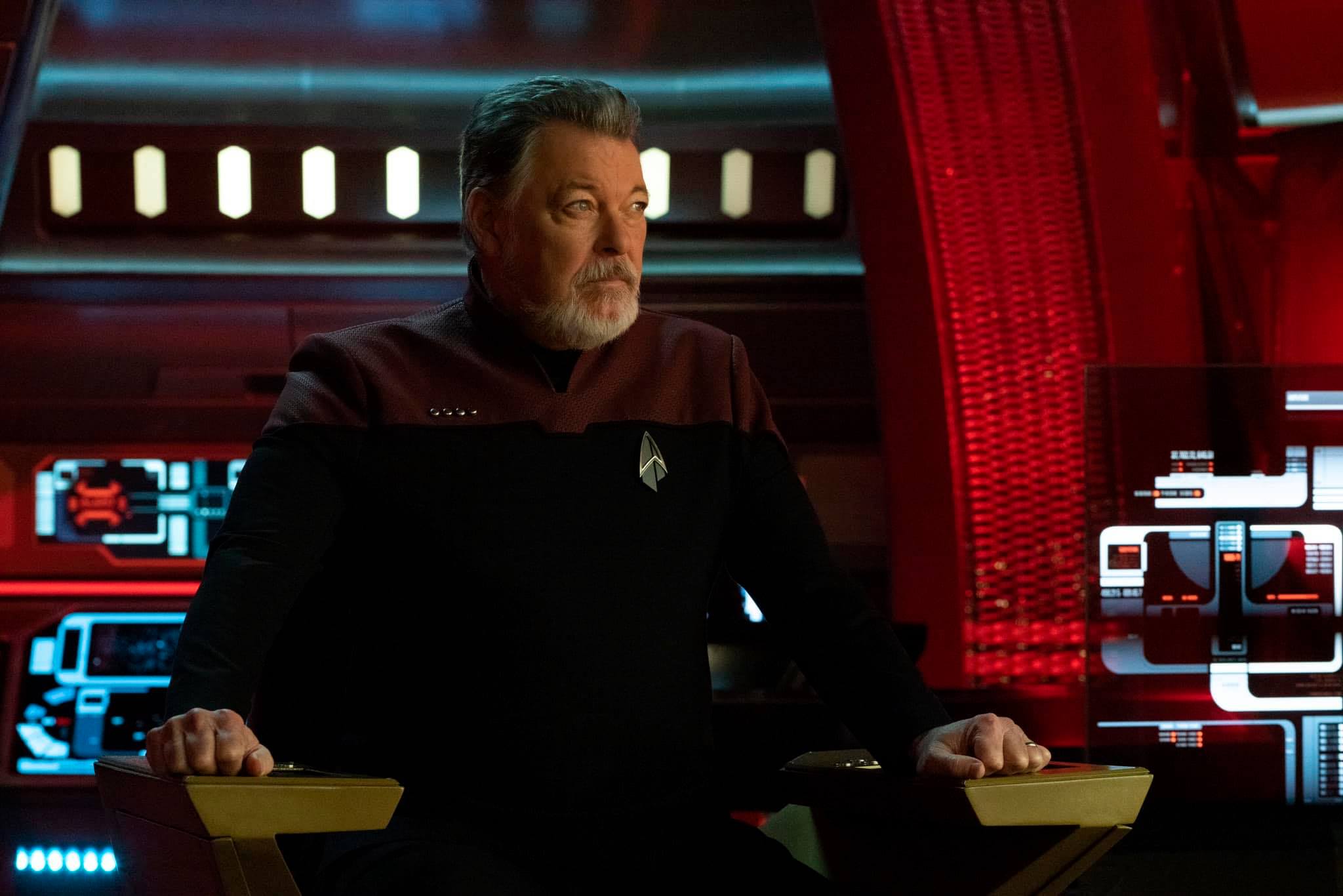 The meme features a photo of a character from the Star Trek: The Next Generation series, specifically William Riker, played by Jonathan Frakes. The image is captioned "I am the one who knocks" and has a screenshot of Riker's character from the show, looking stern and authoritative, with a hint of a scowl on his face.